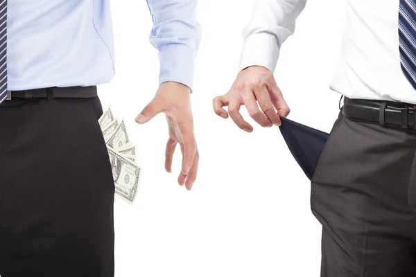 One businessmen grasp money , one pocket empty — Stock Photo, Image