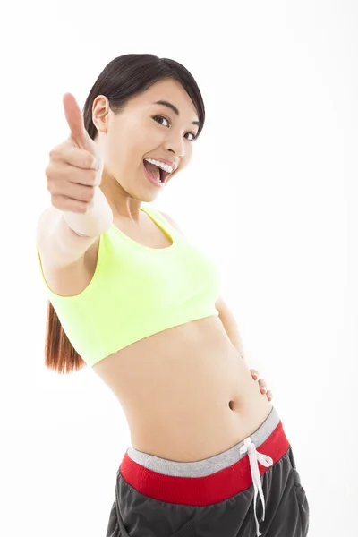 Young woman doing her workout with thumb up — Stock Photo, Image