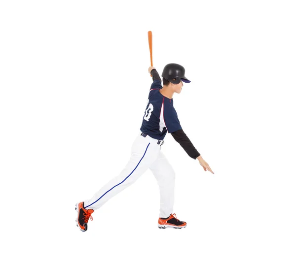 Jogador de beisebol batendo bola com morcego no lado . — Fotografia de Stock