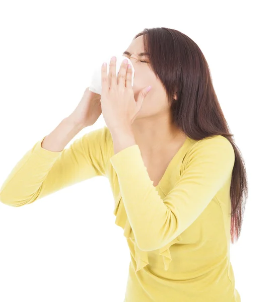 Young woman having flu or allergy and blowing into tissue — Stock Photo, Image