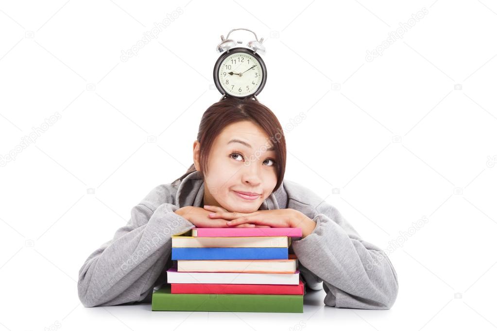happy young student thinking clock with books