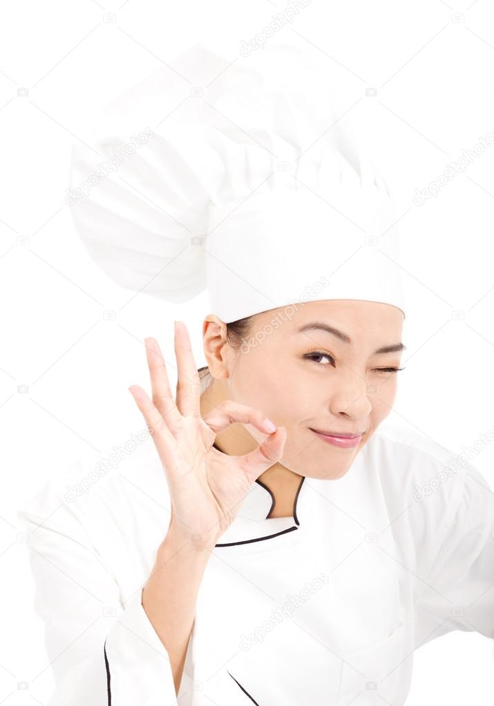 Asian chef baker or cook showing ok hand sign