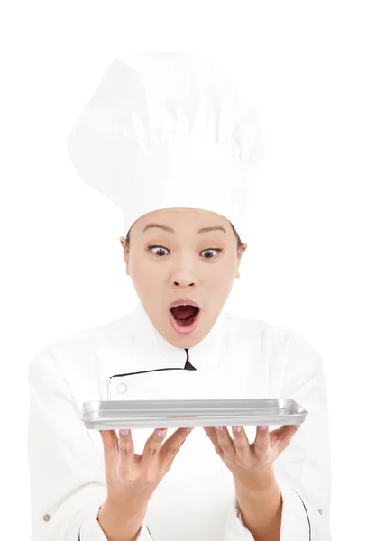 Unbelievable asian woman chef holding tray — Stock Photo, Image