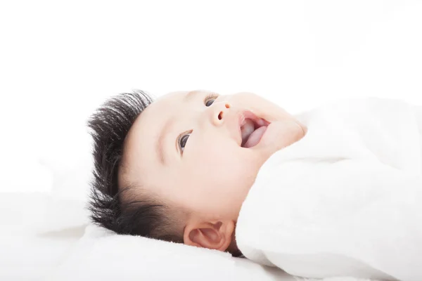 Baby having laughing and lying on the towel — Stock Photo, Image