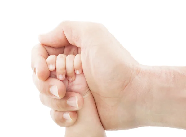 Mors händer hålla barnets hand — Stockfoto