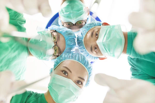 Team surgeon at work in operating room. — Stock Photo, Image