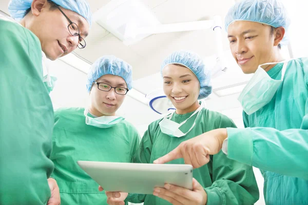 Happy Surgeons discussing success operating procedure — Stock Photo, Image