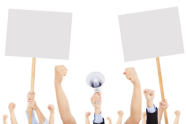 Furious people protesting with board and megaphone