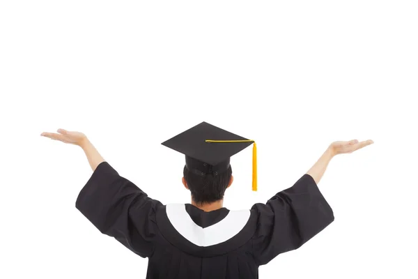 Afstuderen student het dragen van een mortarboard en open handen — Stockfoto