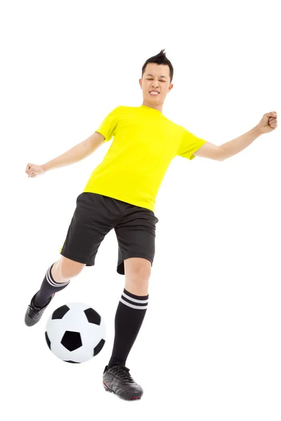 Fußballer kickt Ball — Stockfoto