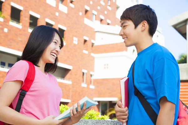 Two students or friends are conversation happily — Stock Photo, Image