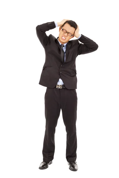 Hombre de negocios tiene un dolor de cabeza con expresión dolorosa —  Fotos de Stock
