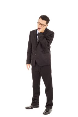 genç işadamı ayakta ve diş ağrısı ile acı içinde