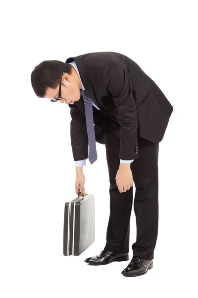 Very tired businessman stoop and holding briefcase — Stock Photo, Image