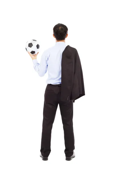 Вид на молодого бизнесмена с футбольным мячом — стоковое фото