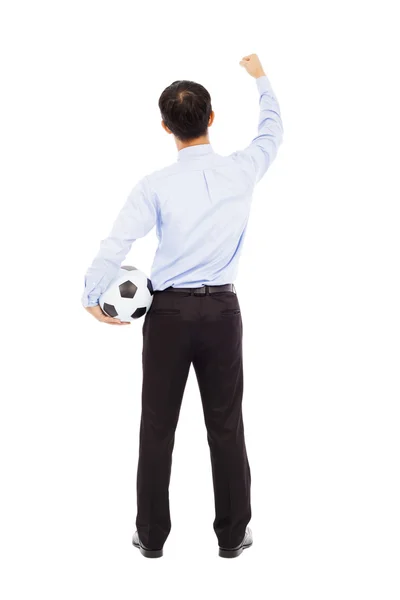 Back view of young businessman hold a ball — Stock Photo, Image