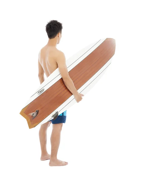 Surfař drží surfovací prkno — Stock fotografie