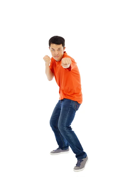 Jovem homem fazer um boxe luta pose — Fotografia de Stock