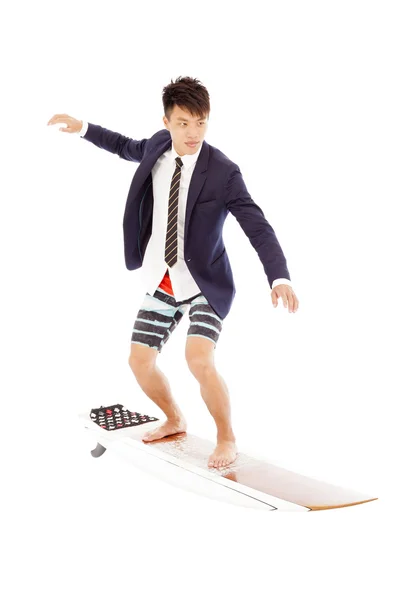 Zakenman praktijk surfen pose — Stockfoto