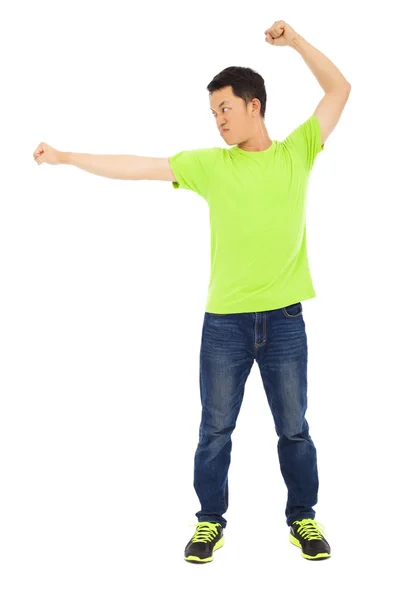 Young man making a martial art pose — Stock Photo, Image
