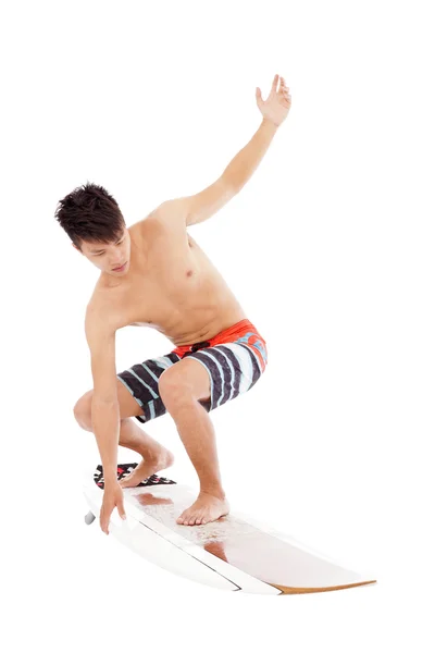 Jeune surfeur faire une pose de surf — Photo