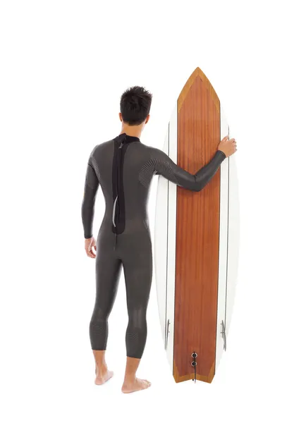 Surfing man wore wet suit and holding surfing board — Stock Photo, Image