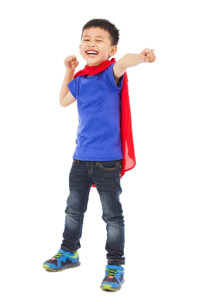 Smiling  superhero kid make a fist pose — Stock Photo, Image