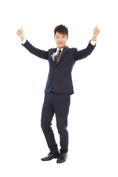 Homem de negócios confiante de pé e polegar para cima — Fotografia de Stock