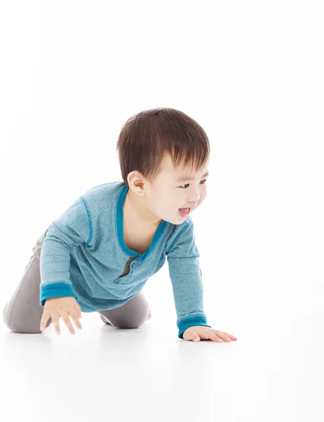 Lindo bebé chico es arrastrándose en el suelo —  Fotos de Stock