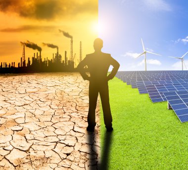 kirlilik ve temiz enerji kavramı. iş adamı izlerken windmil