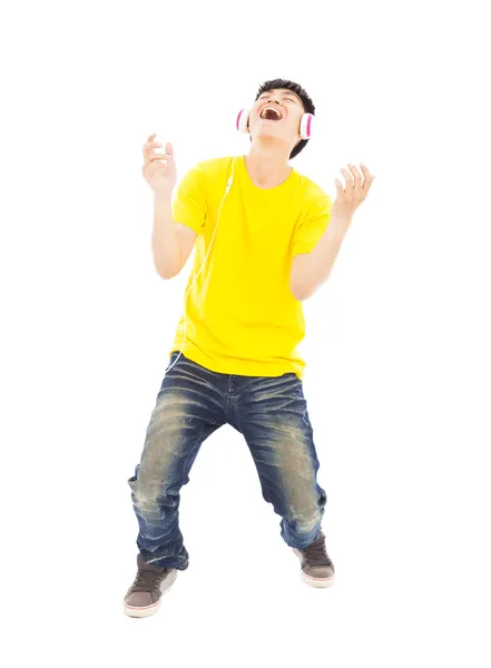 Young man listening music and yelling out — Stock Photo, Image