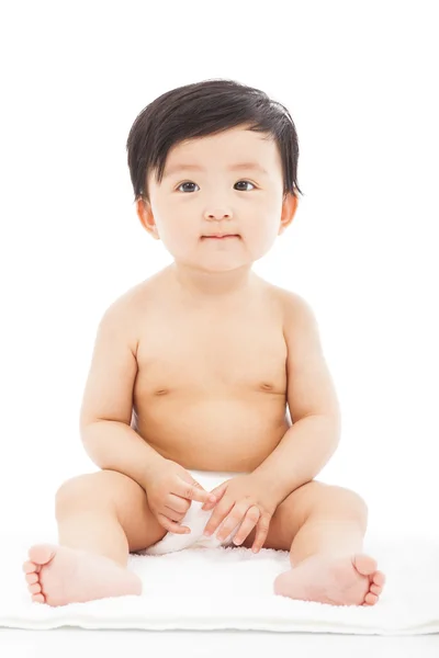 Bebê infantil sentado em um fundo branco — Fotografia de Stock