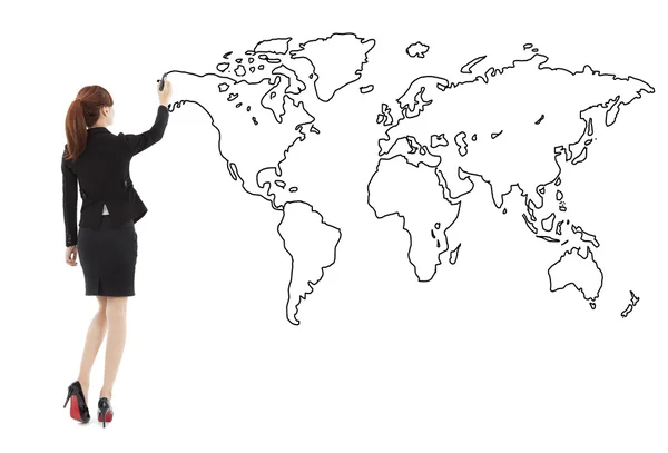 Mujer de negocios de pie y dibujo mapa global — Foto de Stock