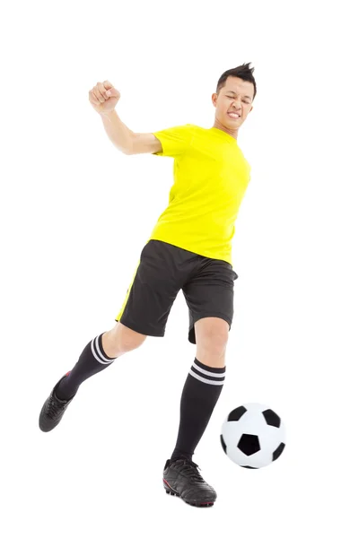 Fußballer kickt Ball — Stockfoto