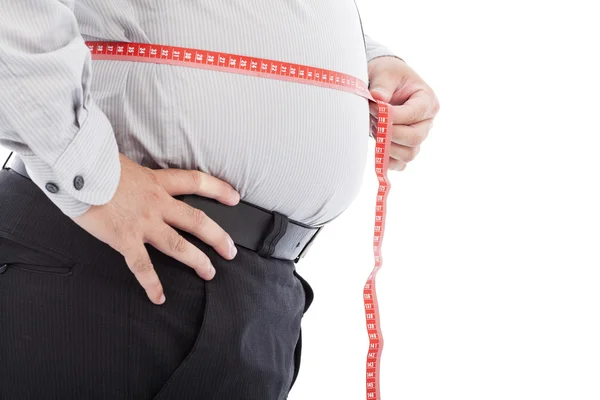 Fat business man use scale to measure his waistline — Stock Photo, Image