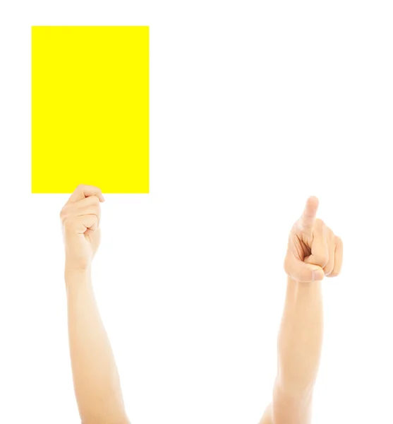 Main d'arbitre avec grand carton jaune pour avertir — Photo