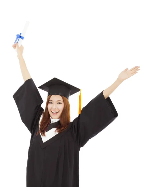 Счастливая выпускница, имеющая степень и изолированная на белом — стоковое фото