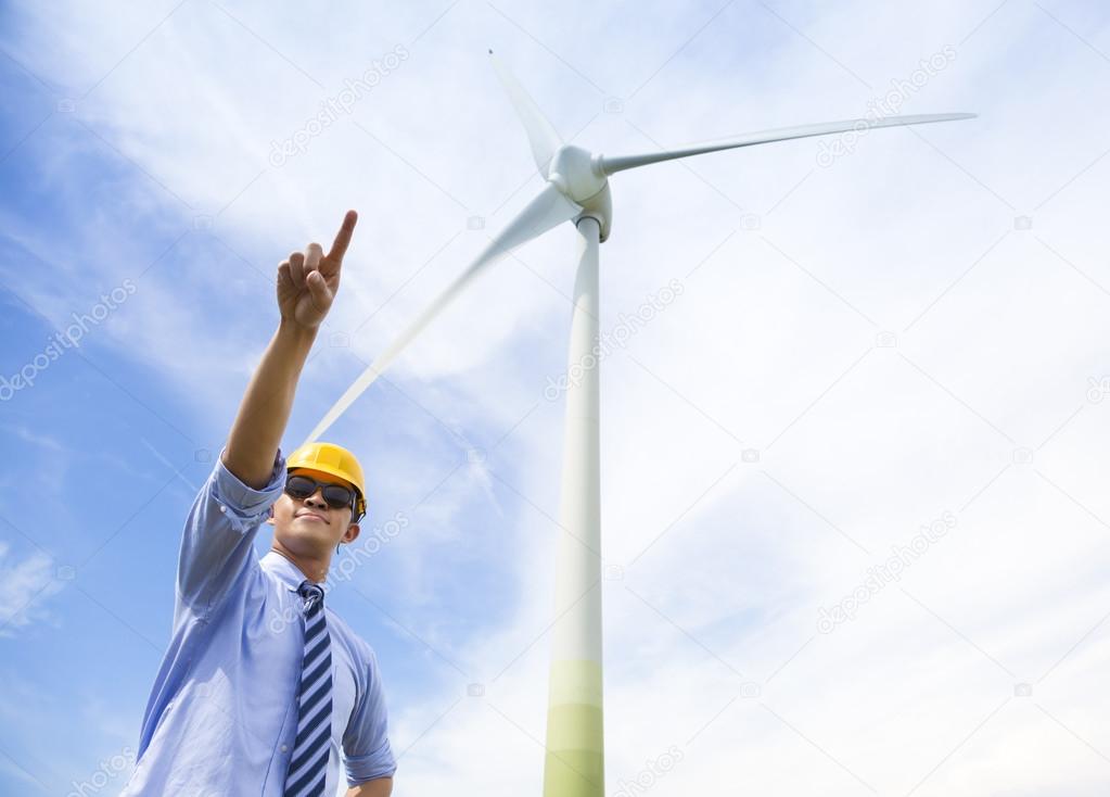 professional engineer raise his finger with wind generator