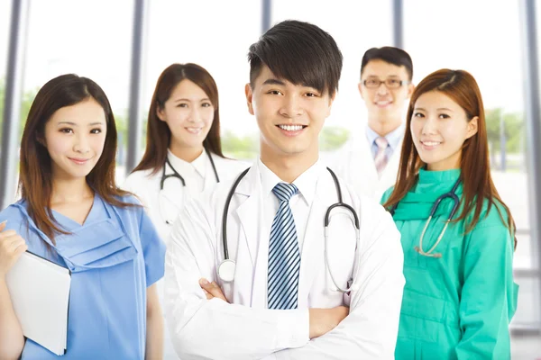 Professional medical doctor team standing over white background — Stock Photo, Image