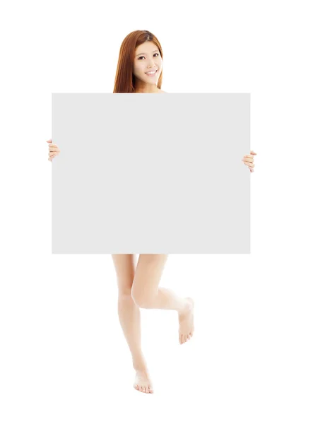 Beautiful young sexy woman holding a empty white board — Stock Photo, Image