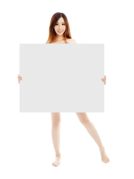 Beautiful young sexy woman holding a empty white board — Stock Photo, Image