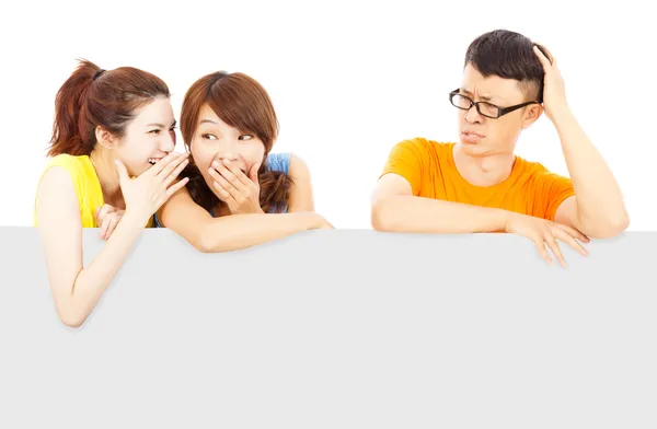 Young female people whisper about the man events — Stock Photo, Image