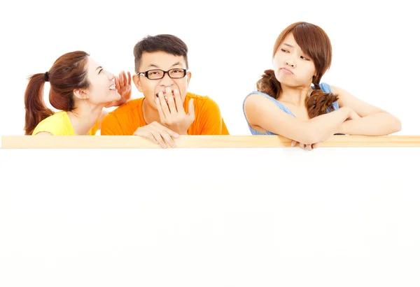 Young girl make a funny expression with friends — Stock Photo, Image