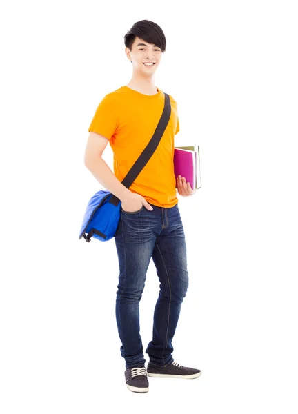 Estudiante confiado sosteniendo libros y mochila inclinada —  Fotos de Stock