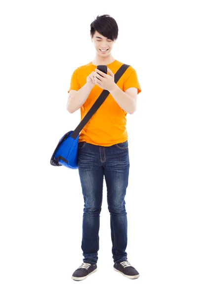 Junge Studentin berührt ein Smartphone mit weißem Hintergrund — Stockfoto