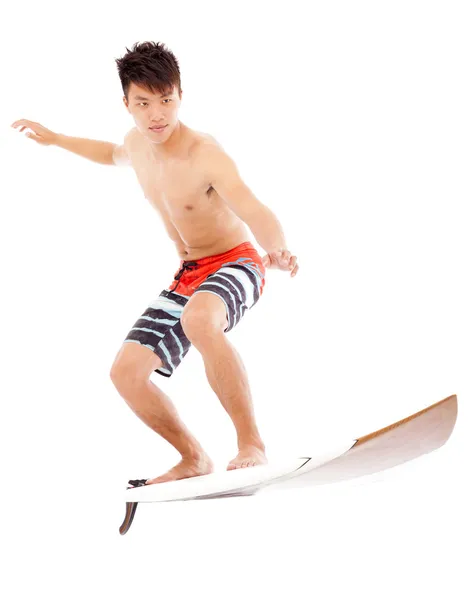 Young surfer practice surfing pose — Stock Photo, Image