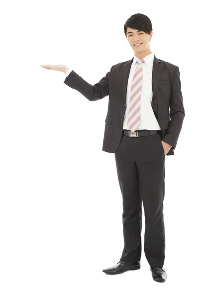 Businessman with welcome and showing gesture — Stock Photo, Image