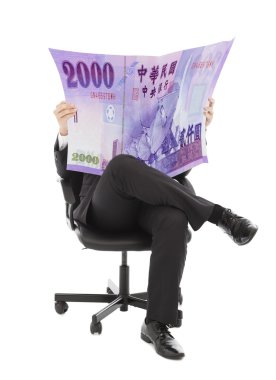 Business man sitting on a chair with taiwan currency in hands clipart