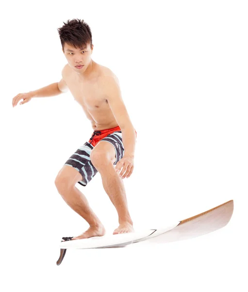 Joven surfista profesional practica surf pose — Foto de Stock