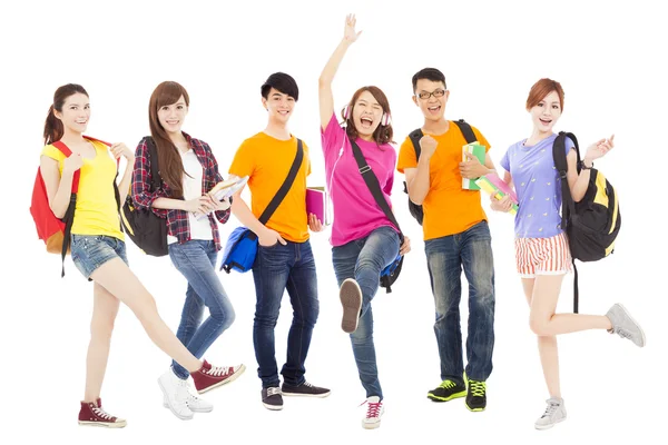 Felici giovani studenti in piedi una fila — Foto Stock